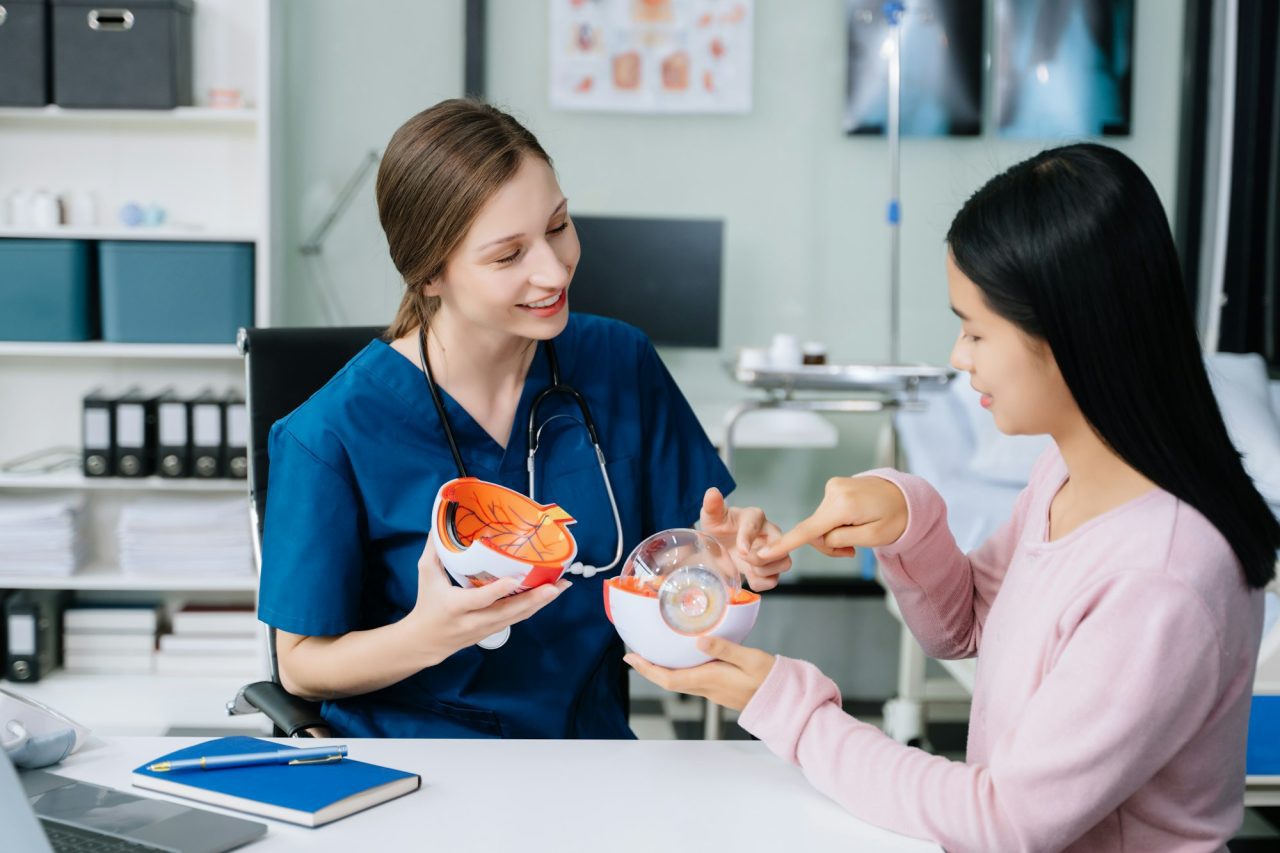 2025 - Início - Home portrait of female doctor explaining diagnosis to her patient doctor meeting with patient Experienced and Compassionate Team
